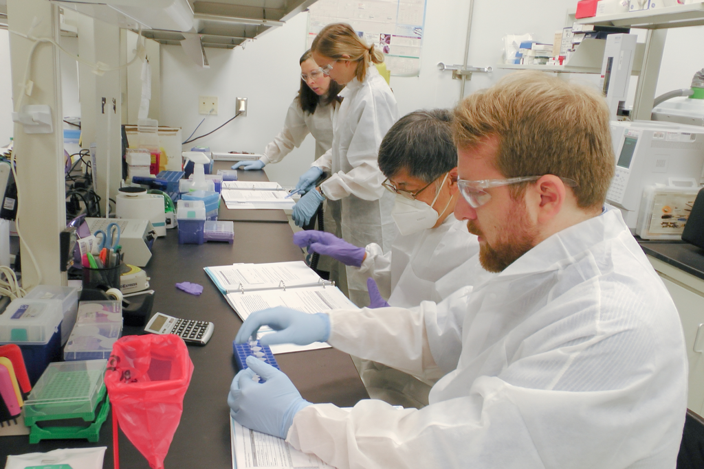 Students in the Analytical Methods for Gene Therapy course at BTEC participate in lab activities.